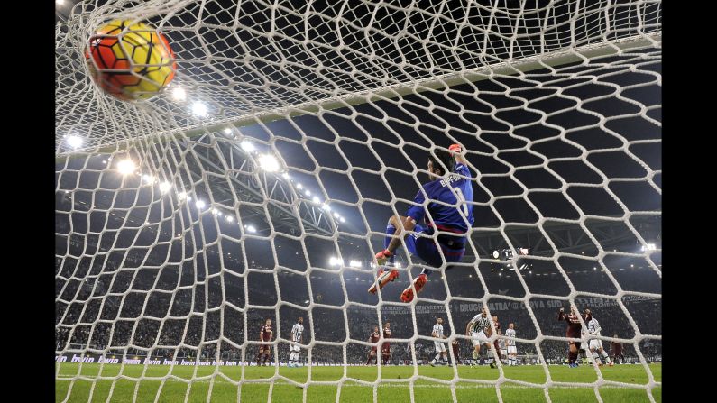 The ball bulges the net behind Juventus' Gianluigi Buffon during a Serie A soccer match in Turin, Italy, on Saturday, October 31. The goal from Torino's Cesare Bovo tied the match at 1-1, but Juventus' Juan Cuadrado scored a late winner. <br /><br />Got a great soccer photo? CNN wants to see your photos of the game, the fans, the atmosphere that Pele famously dubbed beautiful. Tag your best smartphone or camera shots <a href="index.php?page=&url=http%3A%2F%2Fwww.cnn.com%2F2015%2F10%2F23%2Ffootball%2Fmy-beautiful-game-amanda-davies%2F" target="_blank">#MyBeautifulGame</a> and tell us what they mean to you. You could be featured on CNN Sport.