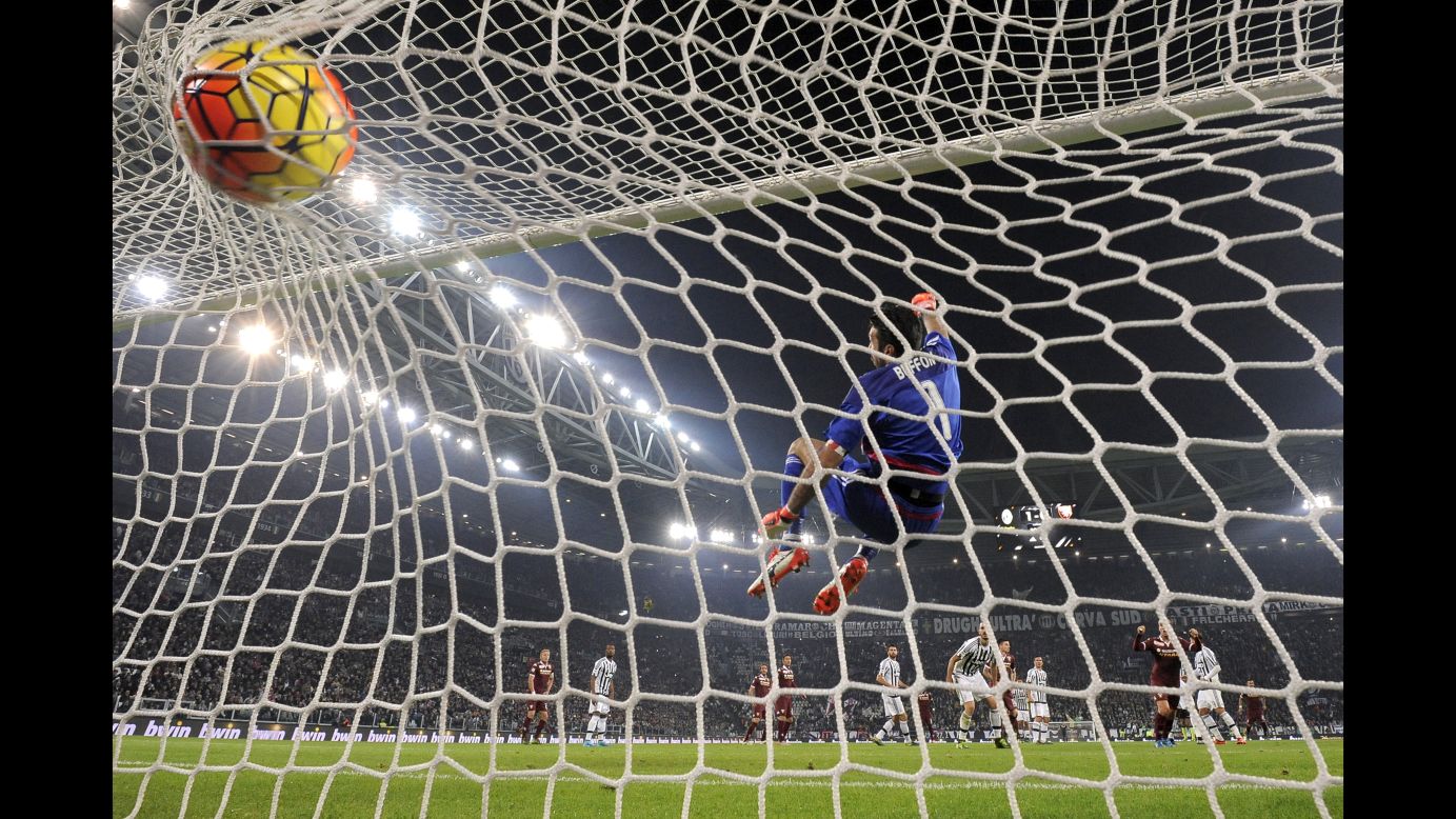 The ball bulges the net behind Juventus' Gianluigi Buffon during a Serie A soccer match in Turin, Italy, on Saturday, October 31. The goal from Torino's Cesare Bovo tied the match at 1-1, but Juventus' Juan Cuadrado scored a late winner. <br /><br />Got a great soccer photo? CNN wants to see your photos of the game, the fans, the atmosphere that Pele famously dubbed beautiful. Tag your best smartphone or camera shots <a href="http://www.cnn.com/2015/10/23/football/my-beautiful-game-amanda-davies/" target="_blank">#MyBeautifulGame</a> and tell us what they mean to you. You could be featured on CNN Sport.