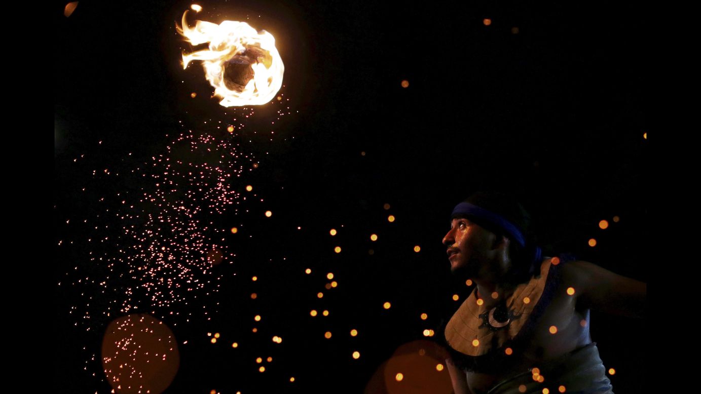 A man in Palmas, Brazil, plays a Mexican game known as La Batalla -- a hockey-like game using a fireball -- during the World Indigenous Games on Thursday, October 29.