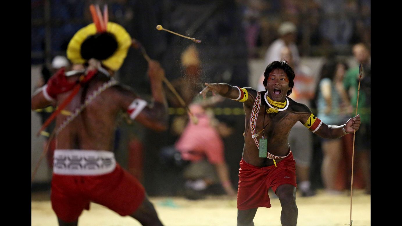 Indigenous men from the Kamayura tribe take part in a demonstration Thursday, October 29, during the World Indigenous Games in Palmas, Brazil. The Kamayura are from the Amazon.