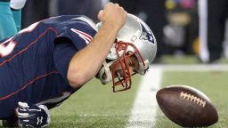 FOXBORO, MA - OCTOBER 29:  Tom Brady #12 of the New England Patriots reacts during the first quarter against the Miami Dolphins at Gillette Stadium on October 29, 2015 in Foxboro, Massachusetts.  (Photo by Darren McCollester/Getty Images)