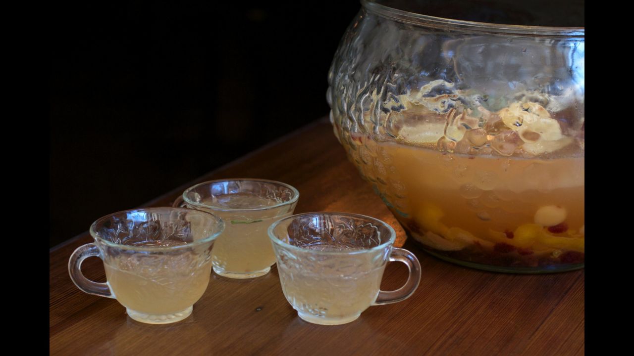 This gin-based <strong>orchard punch</strong> has pear and lemon flavors. Best of all, your guests can just serve themselves, freeing you for other duties.