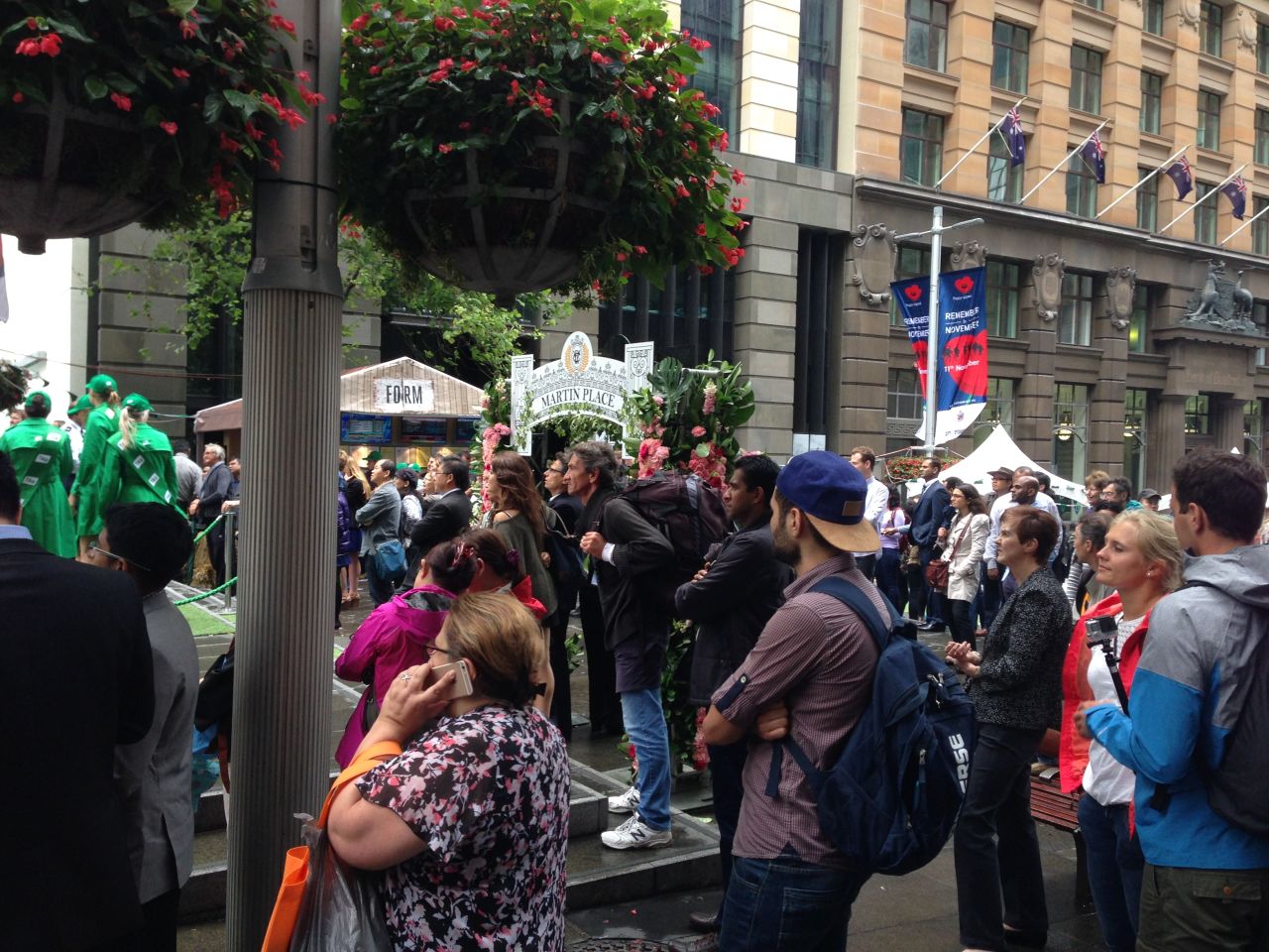 Crowds gather in Sydney's Martin Place -- <a href="http://edition.cnn.com/2014/12/15/world/asia/australia-sydney-hostage-situation/">where the Lindt  Chocolate Cafe shooting took place in December 2014</a> -- to watch the race.