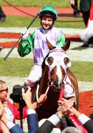 Michelle Payne riding Prince of Penzance celebrates winning the Melbourne Cup at Flemington Racecourse on November 3, 2015 in Melbourne, Australia. She is the first female jockey to ever win the revered race. 