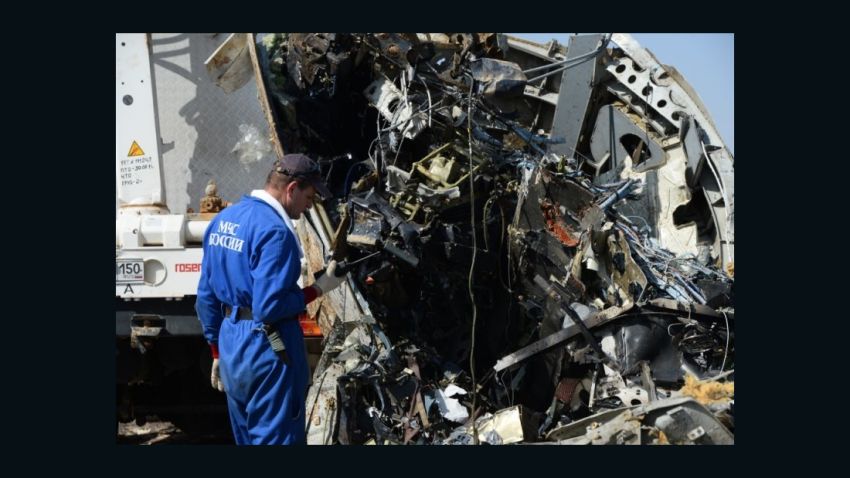 Handout pictures taken on November 2, 2015 and released on November 3, 2015 by Russia's Emergency Ministry shows Russian emergency services personnel and Egyptian servicemen working at the crash site of a A321 Russian airliner in Wadi al-Zolomat, a mountainous area of Egypt's Sinai Peninsula. Russian airline Kogalymavia's flight 9268 crashed en route from Sharm el-Sheikh to Saint Petersburg on October 31, killing all 224 people on board, the vast majority of them Russian tourists.