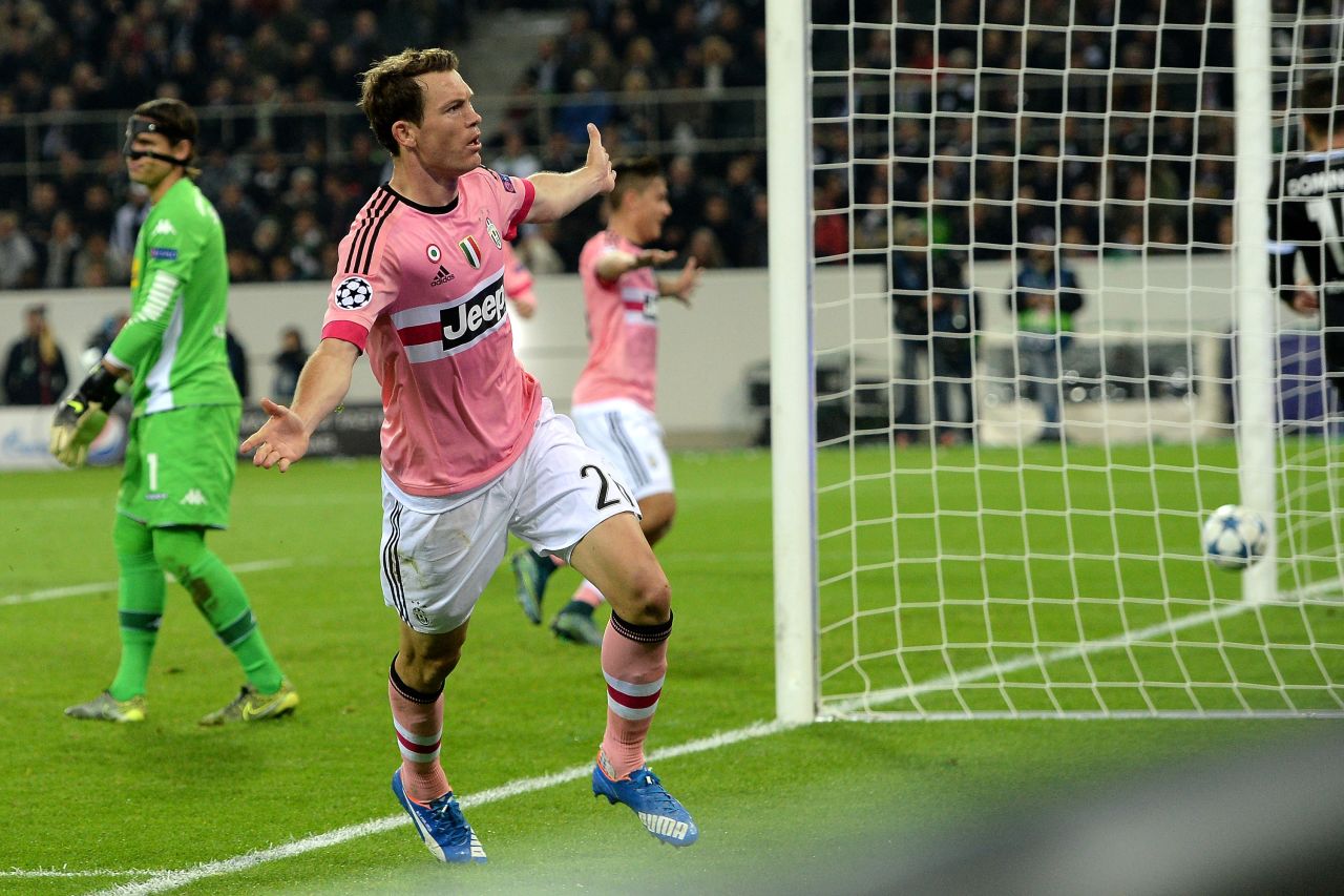 Stephan Lichtsteiner celebrates after scoring second-placed Juventus' equalizer in the 1-1 draw at Borussia Monchengladbach.