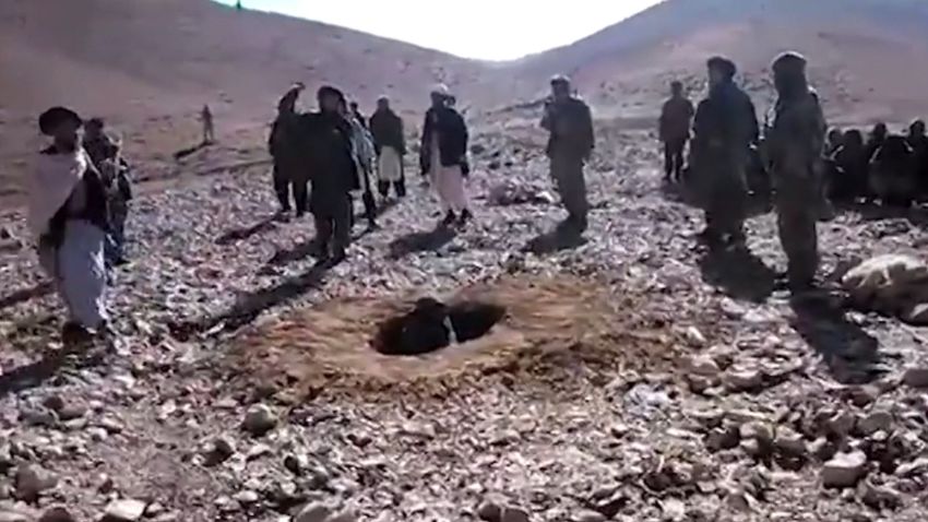 Afghan men stone a woman in a hole to death in Ghalmeen, Afghanistan.