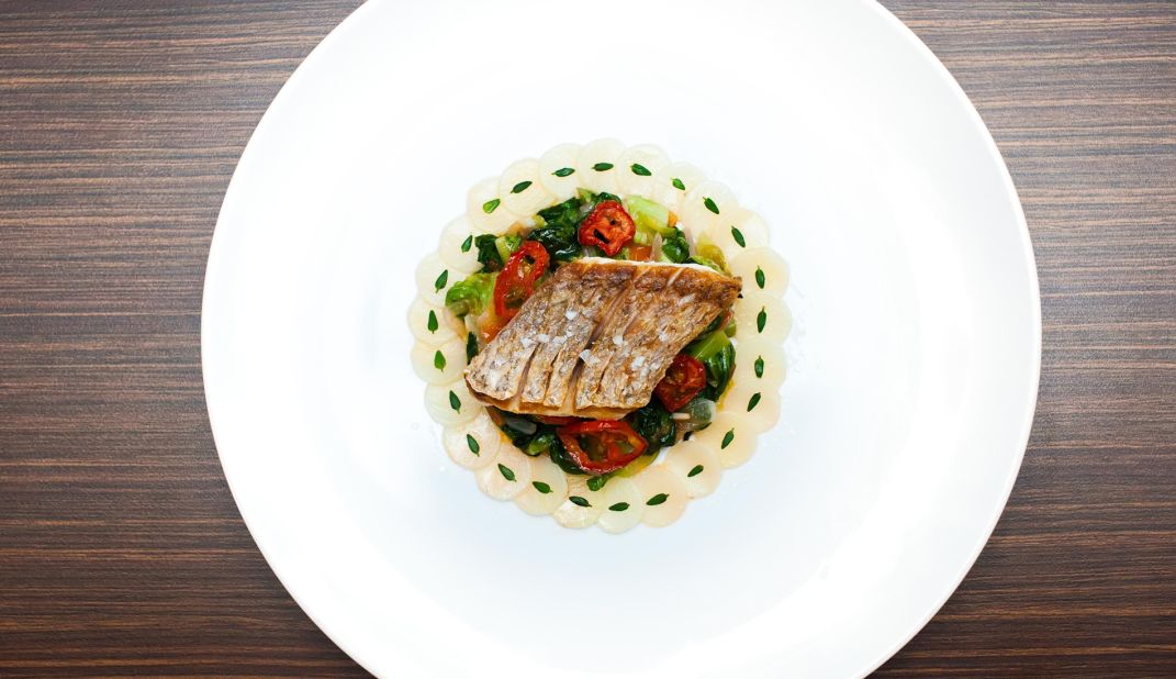 White sea bass, potato, thyme, sauteed vegetables and dehydrated tomatoes. With artistic plates like this, it's no surprise that Yeong recently quit his job to compete in the latest season of "MasterChef Asia." 