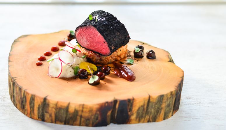 Data processor Aaron Tan calls himself a stay-at-home chef, who cooks mostly for his wife. If this sous vide venison rolled in leek ash tastes as good as it looks he should stay home more often. 