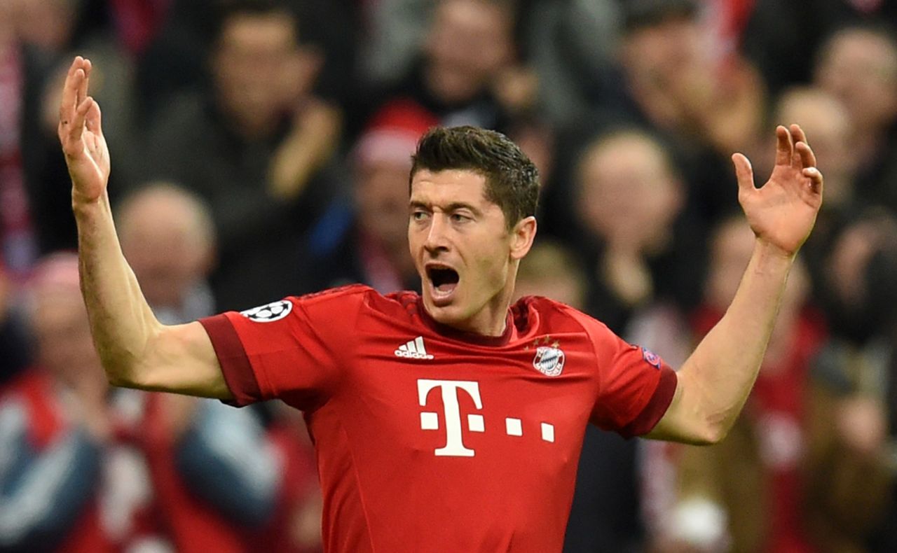 Lewandowski scores the opener in Bayern Munich's 5-1 thrashing of Arsenal in the Champions League, putting the Bavarian side top of Group A.