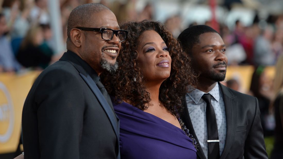 As her clout grows in Hollywood, Oprah has become a regular on the awards-show circuit. Actors Forest Whitaker and David Oyelowo join her for the 20th Annual Screen Actors Guild Awards on January 18, 2014, in Los Angeles.