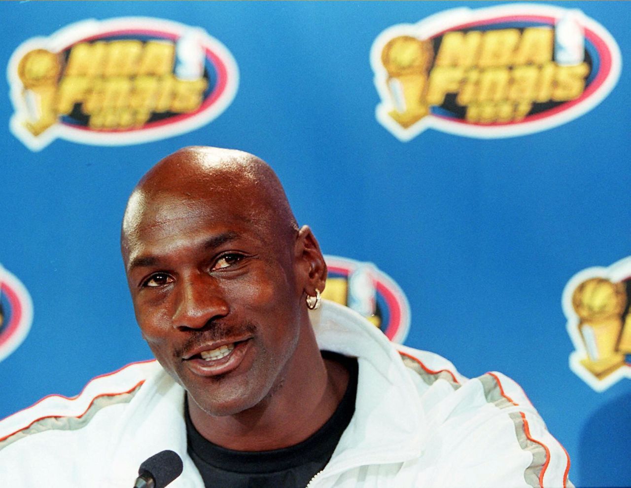 Michael Jordan's shaved head and gold earring was a staple of the '90s NBA look. 