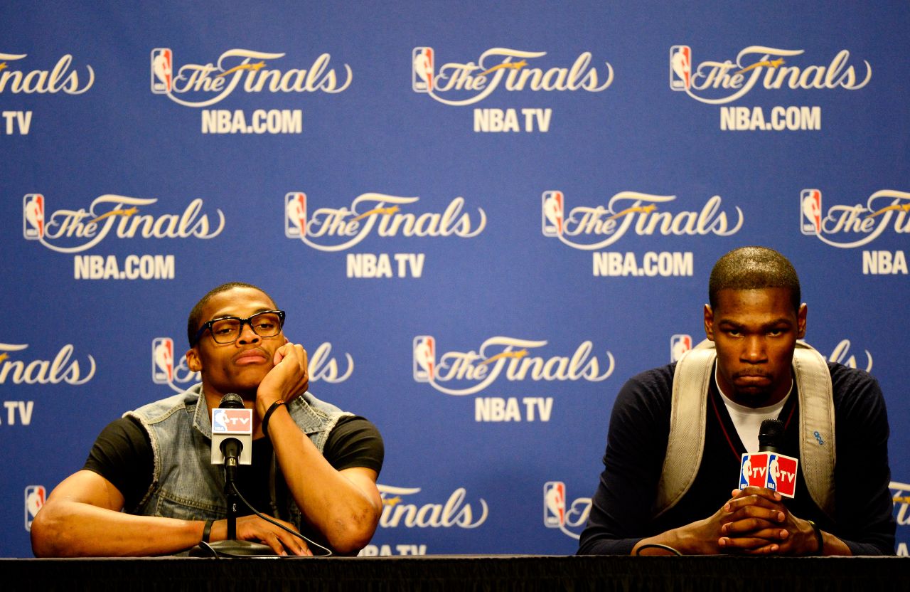 Russell Westbrook (L) and Oklahoma City Thunder teammate Kevin Durant played with different looks during the 2012 NBA Finals. Durant would often wear a backpack as a style accessory to press conferences. 