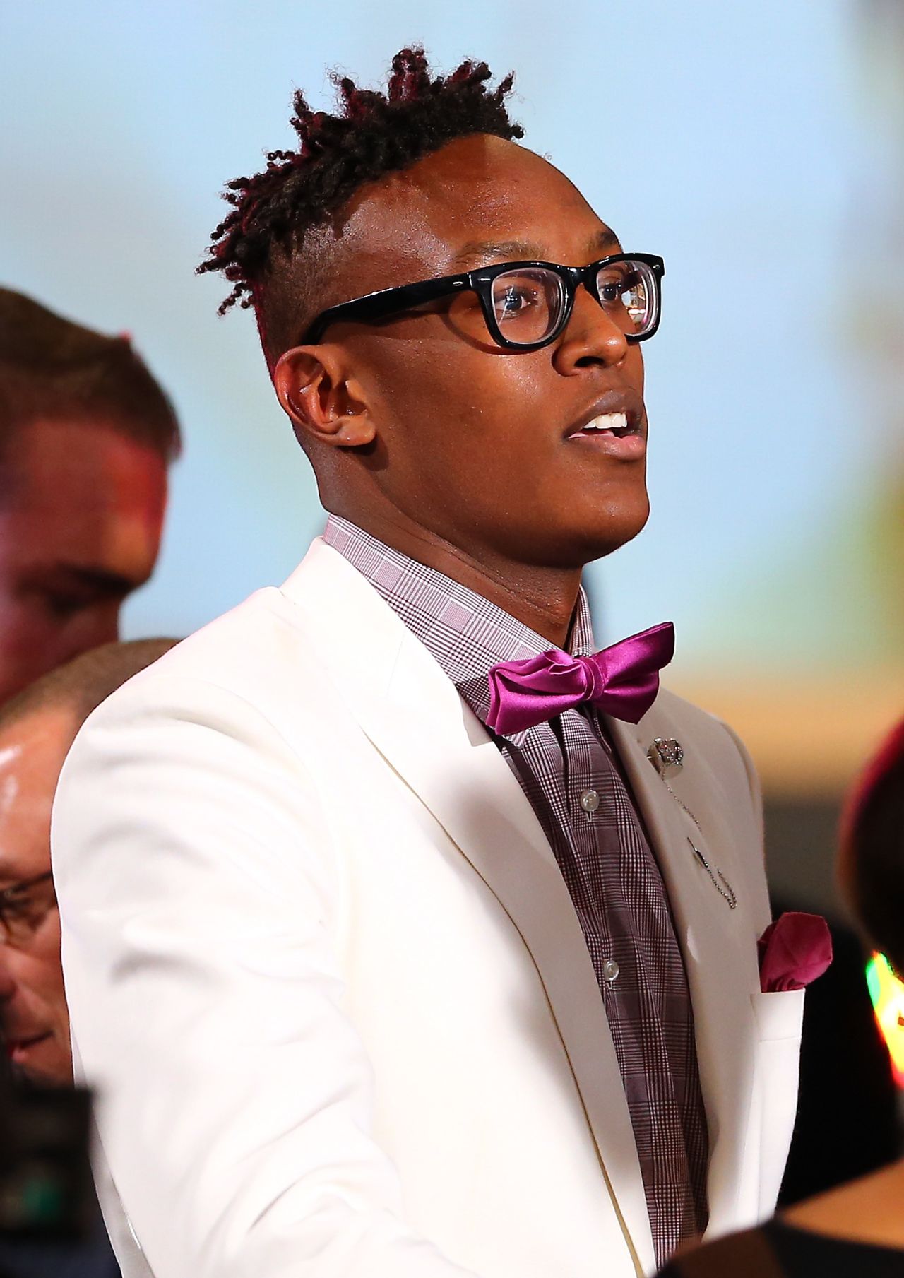 Bow tie or no bow tie? Myles Turner flaunts his violet neck accessory after being selected 11th overall by the Indiana Pacers in the first round of the 2015 draft.