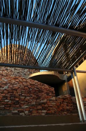 The structure also took design inspiration from its surrounding "complex landscape" -- an effort which the judges also noted to be particularly well executed. Mapungubwe Interpretation Centre was selected from a total of 15 finalists. Upon winning the award, architect Peter Rich said, "I will continue my quest to be of service to the less privileged, because they deserve it."  