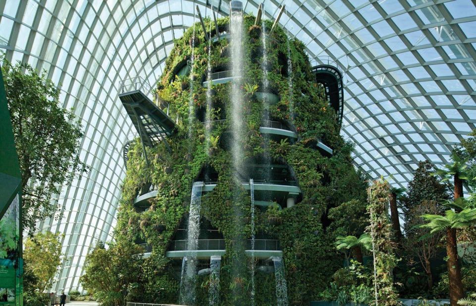 The two climates contained are the "Flower Dome," which features a cool dry environment, and the "Cloud Forest," which features a cool and moist environment. The structure covers an area of over 20,000 square meters and features an indoor waterfall. 