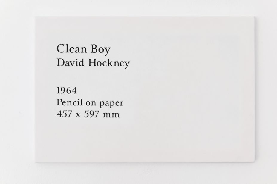 Elmgreen & Dragset have created a "self-portrait" consisting of labels to other artists' work, recreated using orthodox fine art techniques. Here a label recalling a David Hockney drawing is made by engraving a flawless slab of white marble.