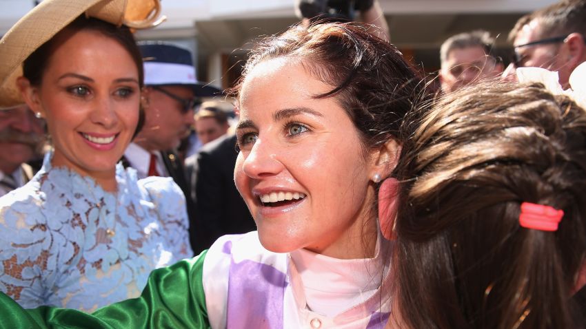 MELBOURNE, AUSTRALIA - NOVEMBER 03:  Michelle Payne celebrates her winning ride on Prince Of Penzance with her sisters to win race 7 the Emirates Melbourne Cup on Melbourne Cup Day at Flemington Racecourse on November 3, 2015 in Melbourne, Australia.  (Photo by Michael Dodge/Getty Images)