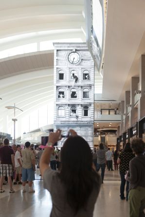 The 22-meter Time Tower is the crux of media studio Moment Factory's huge interactive multimedia exhibition at Los Angeles International Airport. The walls of the clock regularly screen animations that mimic dancers operating the mechanics inside the timepiece. 