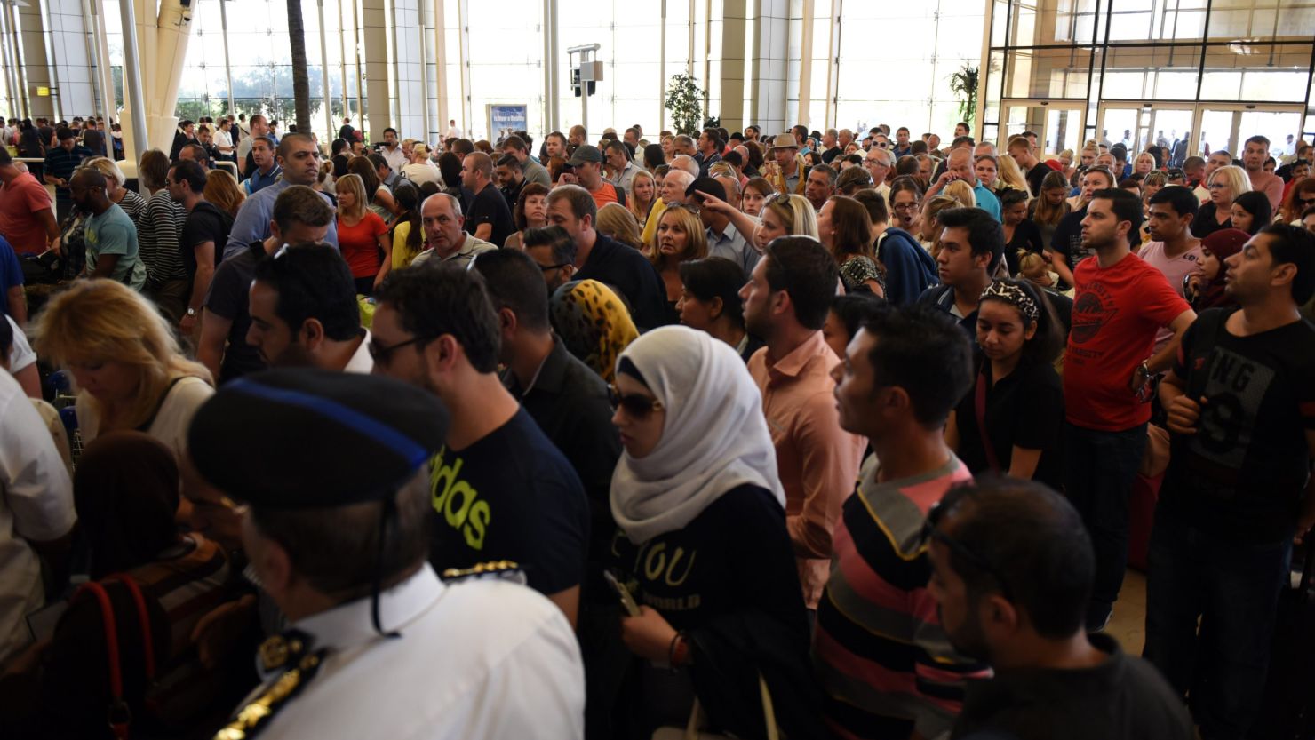 Tourists wait at the airport in Egypt's Red Sea resort of Sharm El-Sheikh on Friday.
