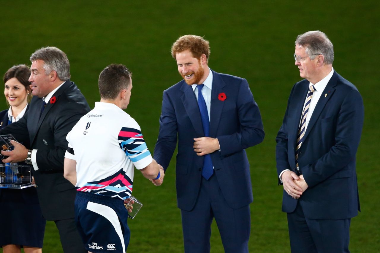 "I didn't want to be gay," Owens, seen here greeting Prince Harry before the Rugby World Cup final, told CNN. "I actually went to the doctor at one stage to see if I could be chemically castrated in any way, if it would get rid of me being gay."