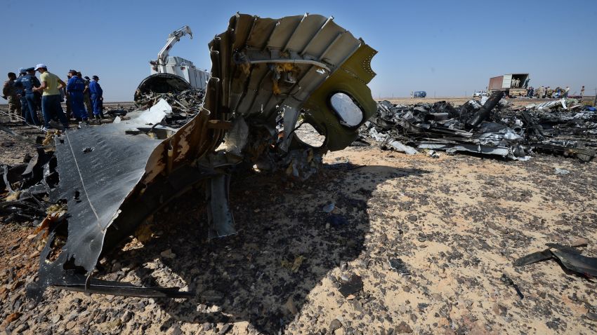 In this Russian Emergency Situations Ministry photo, made available on Monday, Nov. 2, 2015, Russian Emergency Ministry experts work at the crash site of a Russian passenger plane bound for St. Petersburg in Russia that crashed in Hassana, Egypt's Sinai Peninsula, on Monday, Nov. 2, 2015. A Russian cargo plane on Monday brought the first bodies of Russian victims home to St. Petersburg, from Egypt.(Russian Ministry for Emergency Situations photo via AP)