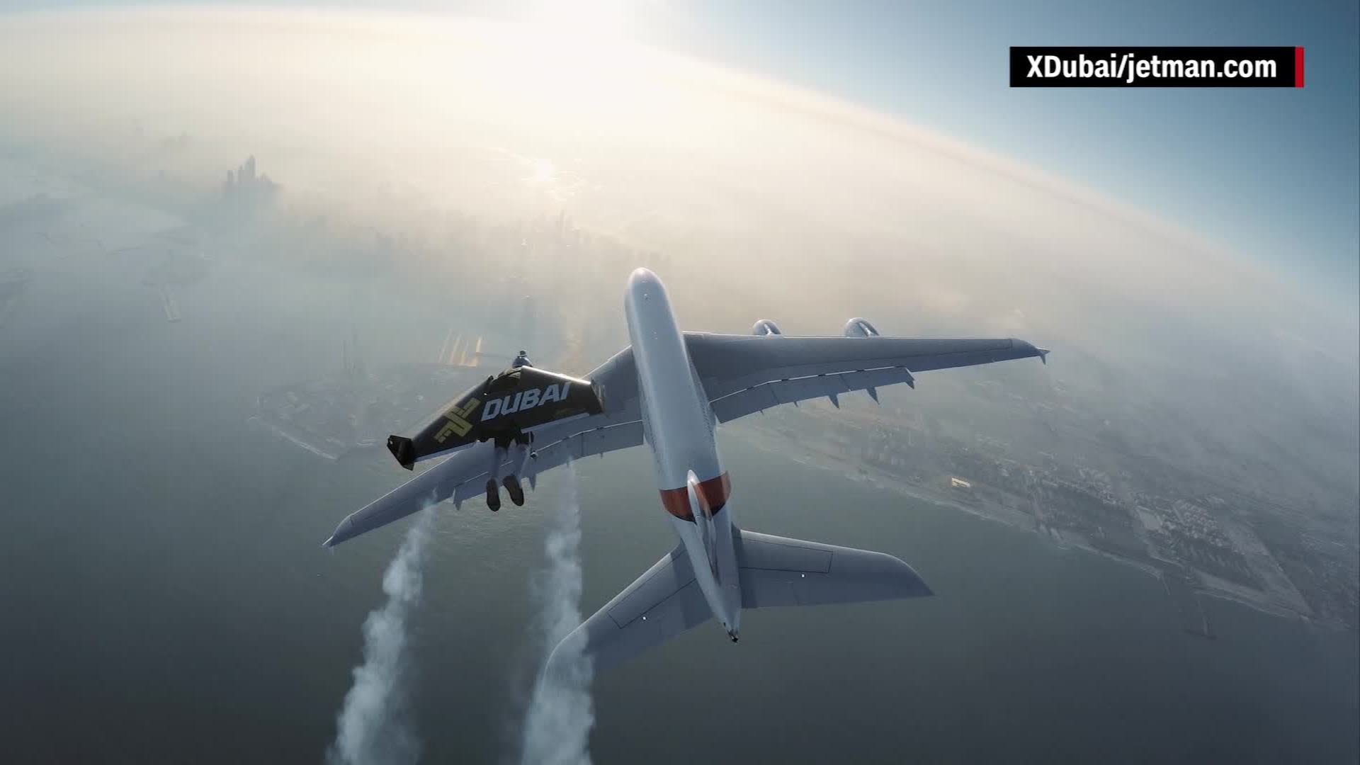 Watch Jetpack-Wearing Daredevils Zoom Past a Jumbo Jet (Video)