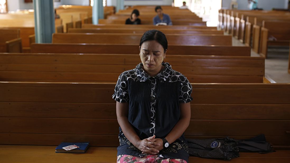 A devotee prays at a chanting ceremony in Mandalay, Myanmar, on November 7 to bless citizens and to pray for a fair and peaceful election.