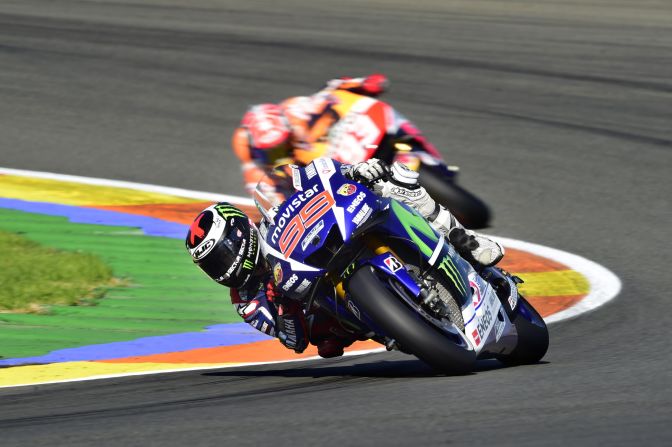 Here Lorenzo is pictured battling two-time champion Marquez for top spot in the Valencia MotoGP.