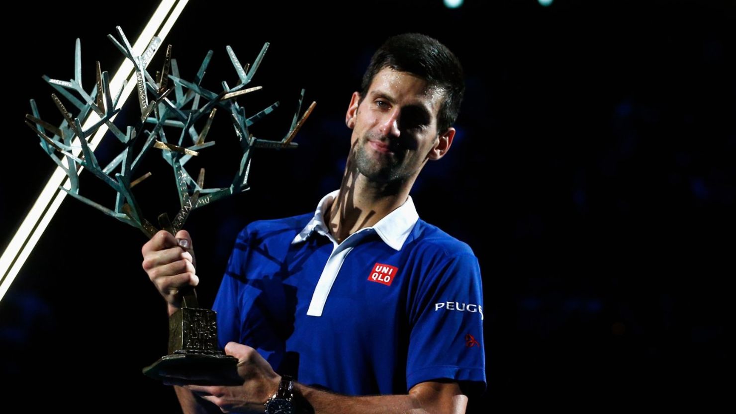 Novak Djokovic lifts the trophy after victory after beating Andy Murray of Great Britain in the final of the Paris Masters1000 tournament. 