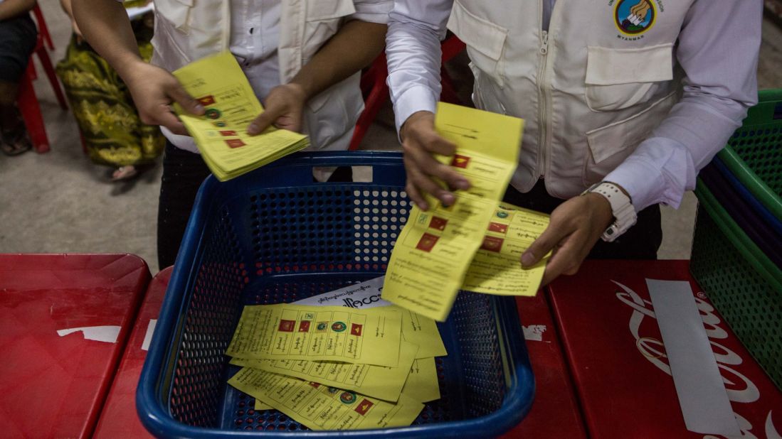 Votes are counted in a polling station in Yangon on November 8.