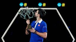 PARIS, FRANCE - NOVEMBER 08:  Novak Djokovic of Serbia poses with the trophy after victory against Andy Murray of Great Britain in their Mens Final match during Day 7 of the BNP Paribas Masters held at AccorHotels Arena on November 8, 2015 in Paris, France.  (Photo by Dean Mouhtaropoulos/Getty Images)