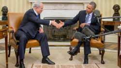 President Barack Obama shakes hands with Israeli Prime Minister Benjamin Netanyahu in the Oval Office of the White House in Washington, Monday, Nov. 9, 2015. The president and prime minister sought to mend their fractured relationship during their meeting, the first time they have talked face to face in more than a year. (AP Photo/Andrew Harnik)