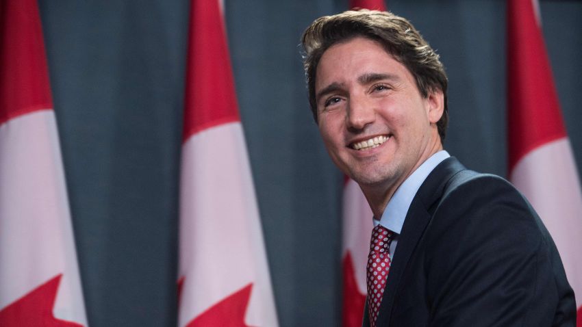 Canadian Liberal Party leader Justin Trudeau smiles at the end of a press conference in Ottawa on October 20, 2015 after winning the general elections.  Liberal leader Justin Trudeau reached out to Canada's traditional allies after winning a landslide election mandate to change tack on global warming and return to the multilateralism sometimes shunned by his predecessor.   AFP PHOTO/NICHOLAS KAMM        (Photo credit should read NICHOLAS KAMM/AFP/Getty Images)