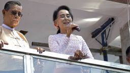 Myanmar's opposition leader Aung San Suu Kyi delivers a speech next to party patron Tin Oo in Yangon, Myanmar on November 9, 2015.