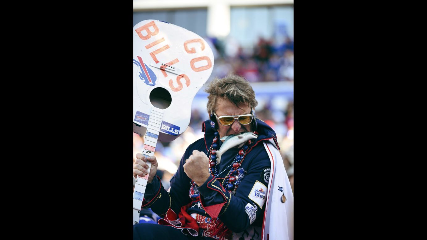 A fan of the NFL's Buffalo Bills fan cheers during a home game against Miami on Sunday, November 8.