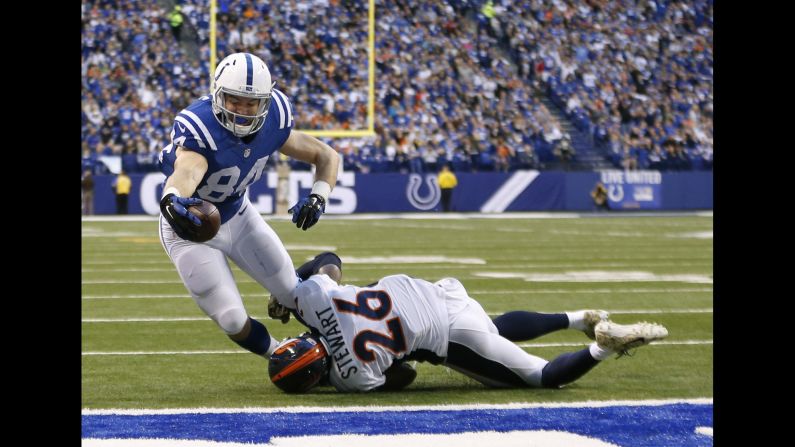 Indianapolis tight end Jack Doyle reaches for a 3-yard touchdown during a home victory against Denver on Sunday, November 8. It was the first loss of the season for Denver, which fell to 7-1. The Colts improved to 4-5.