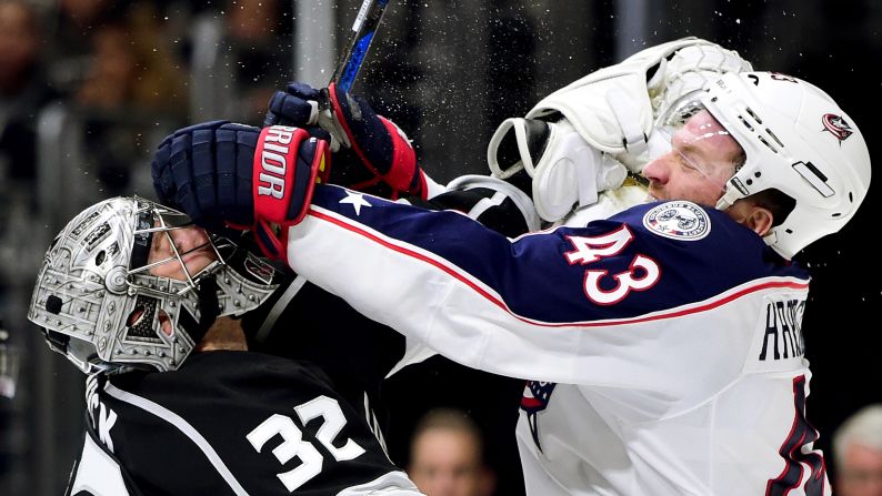 Los Angeles goalie Jonathan Quick tangles with Columbus forward Scott Hartnell during an NHL game in Los Angeles on Thursday, November 5. Both players received slashing penalties, but Hartnell got an additional two minutes for roughing.
