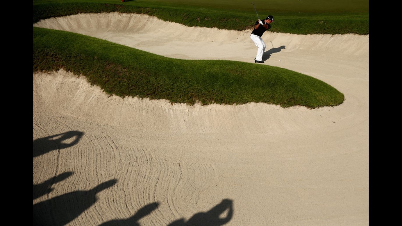 Ricardo Gouveia plays out of a bunker Saturday, November 7, during the final round of the NBO Golf Classic Grand Final, a Challenge Tour event in Muscat, Oman. Gouveia won the tournament and will move up to the European Tour next season.
