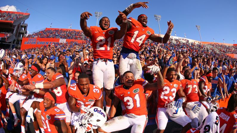 Football players from the University of Florida celebrate their home victory over Vanderbilt on Saturday, November 7. The win also clinched the SEC Eastern Division title -- the Gators' first since 2009.