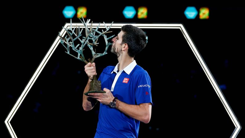 Novak Djokovic poses with his trophy after <a href="index.php?page=&url=http%3A%2F%2Fwww.cnn.com%2F2015%2F11%2F08%2Fsport%2Ftennis-djokovic-murray-paris-masters%2F" target="_blank">winning the Paris Masters</a> on Sunday, November 8. Djokovic, who has lost only five times this season, defeated Andy Murray in the final. 