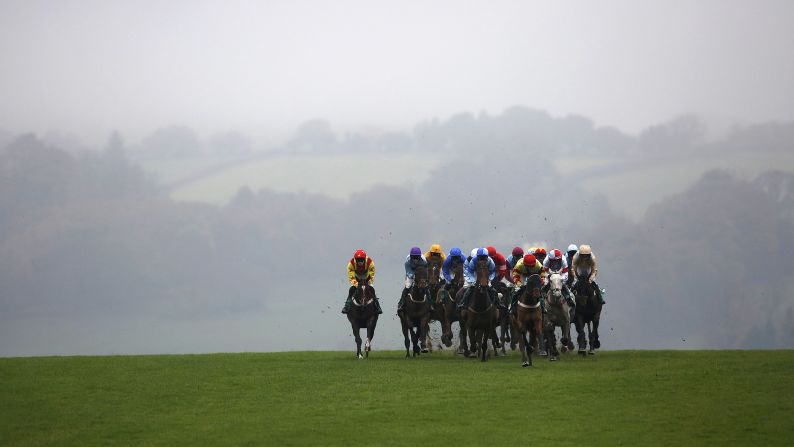Horses race to the bottom bend at the Chepstow Racecourse in Chepstow, Wales, on Wednesday, November 4. <a href="index.php?page=&url=http%3A%2F%2Fwww.cnn.com%2F2015%2F11%2F03%2Fsport%2Fgallery%2Fwhat-a-shot-sports-1103%2Findex.html" target="_blank">See 40 amazing sports photos from last week</a>