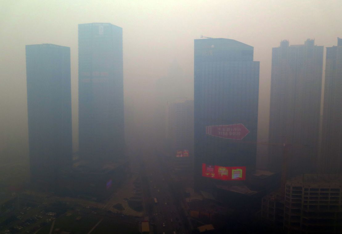 A residential block covered in smog in Shenyang, China's Liaoning province,  November 8, 2015.
