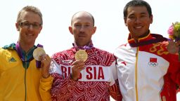 (L-R) Silver medalist Jared Tallent of Australia, gold medalist Sergey Kirdyapkin of Russia and bronze medalist Tianfeng Si of China pose during the medal ceremony for the Men's 50km Walk on Day 15 of the London 2012 Olympic Games on The Mall on August 11, 2012 in London, England.  