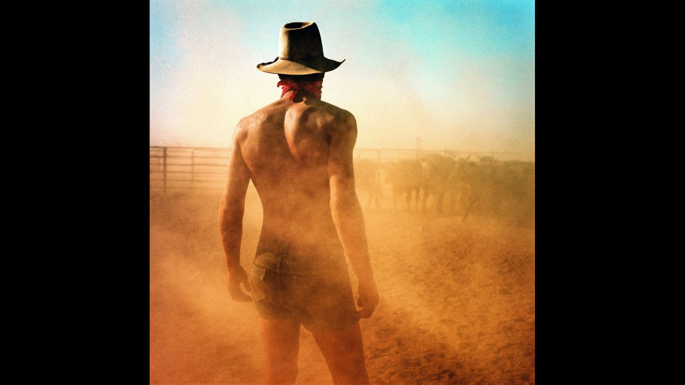 In 1980, Swedish fashion and advertising photographer Hakan Ludwigson "escaped" the rat race of his usual work by traveling through Australia. There he came upon a community of "stockmen," cowboys who do grueling work in the Outback. Ludwigson was so fascinated with the culture that he vowed to chronicle it one day. That wish became his book "Balls and Bulldust," released in September. Pictured is stationhand Stuart Brown of Christchurch, New Zealand, drafting cattle in Victoria River Downs, Northern Territory.