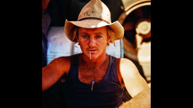 Some of the stationhands grew up farming while others came from the city to experience a new and challenging way of life. "They come here for the cowboy romance, but after months in the heat and dust, they give up,"  a Northern Territory station manager told Ludwigson. "Some may stay for a couple of seasons." Andrew Simkind, 29, of Sydney, who had been a stockman for four years, at Victoria River Downs station in the Northern Territory.