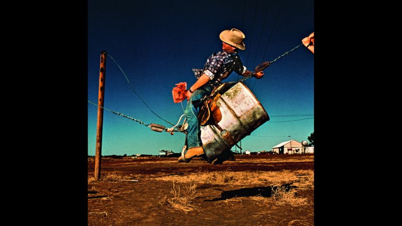 A cowboy does some saddle bronc training on a makeshift mechanical bull in Rockhampton Downs, Northern Territory. 