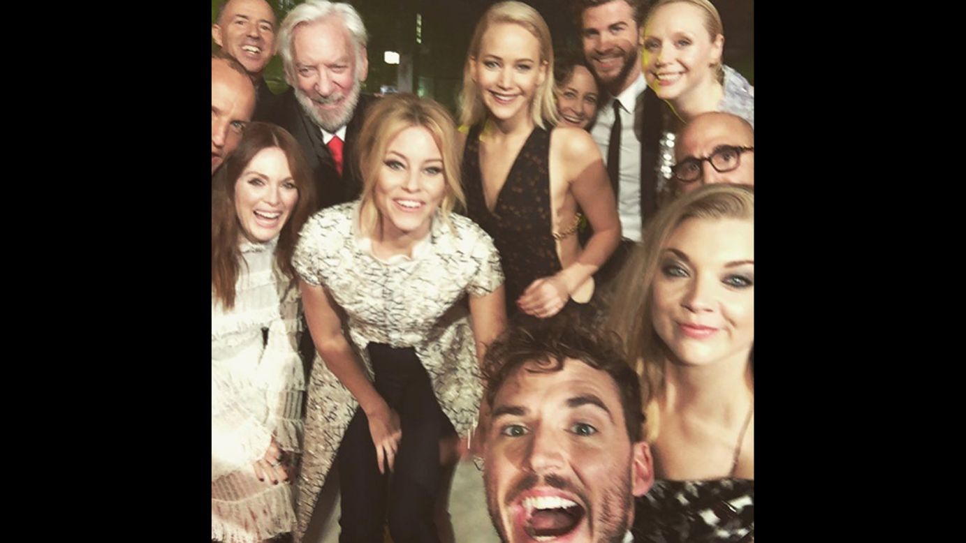 Members of the "Hunger Games" cast take a photo together at the London premiere of "Mockingjay: Part 2" on Thursday, November 5. "This isn't goodbye, it's a see you soon," actor Sam Claflin, bottom, <a href="https://www.instagram.com/p/9tysWApumj/" target="_blank" target="_blank">said on Instagram.</a>