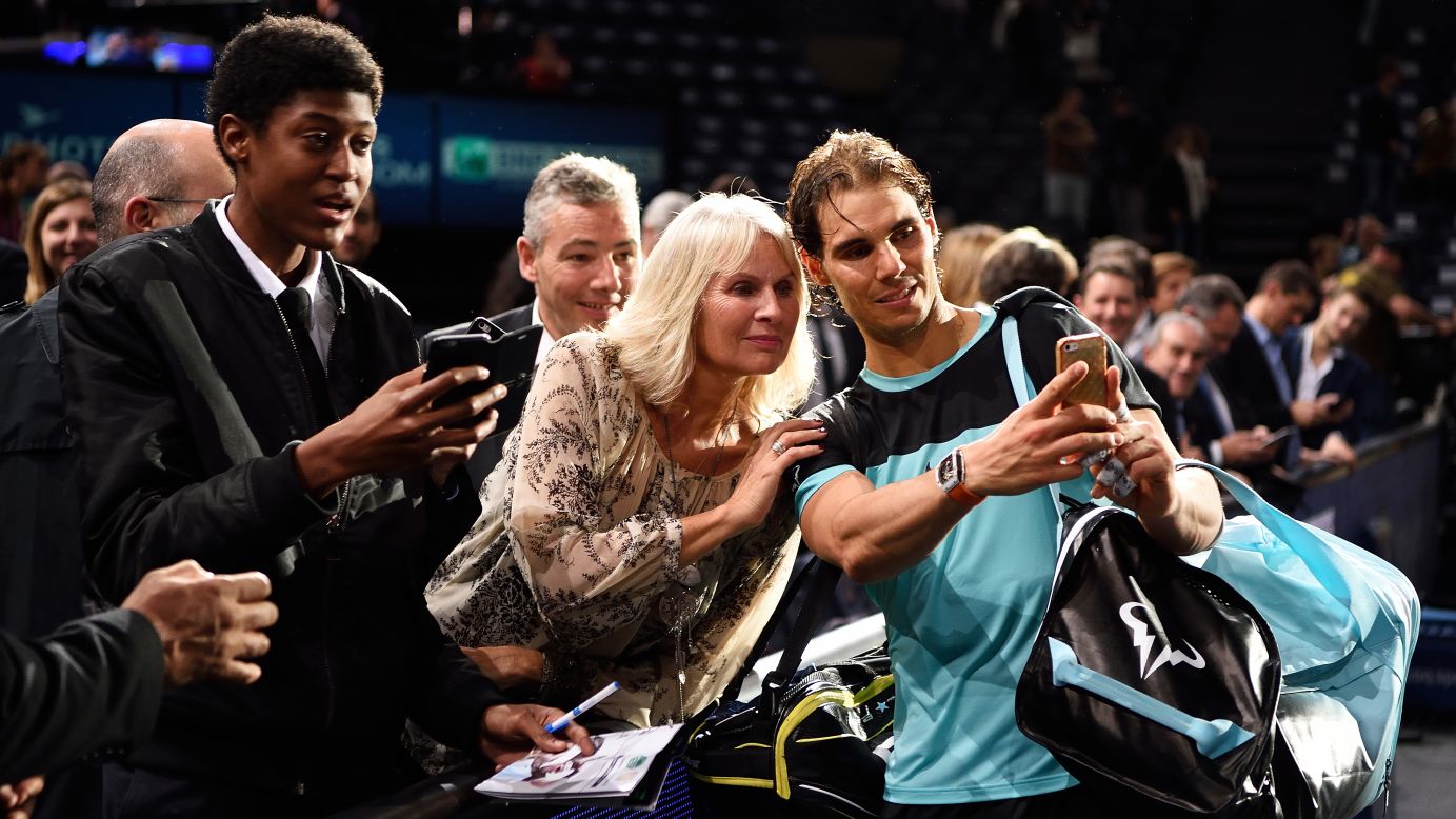 Tennis star Rafael Nadal takes a selfie with a fan at the Paris Masters on Thursday, November 5.