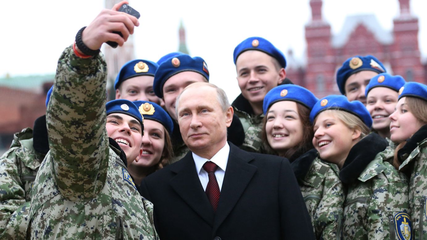 Russian President Vladimir Putin poses with cadets in Moscow's Red Square on Wednesday, November 4. It was National Unity Day in Russia.